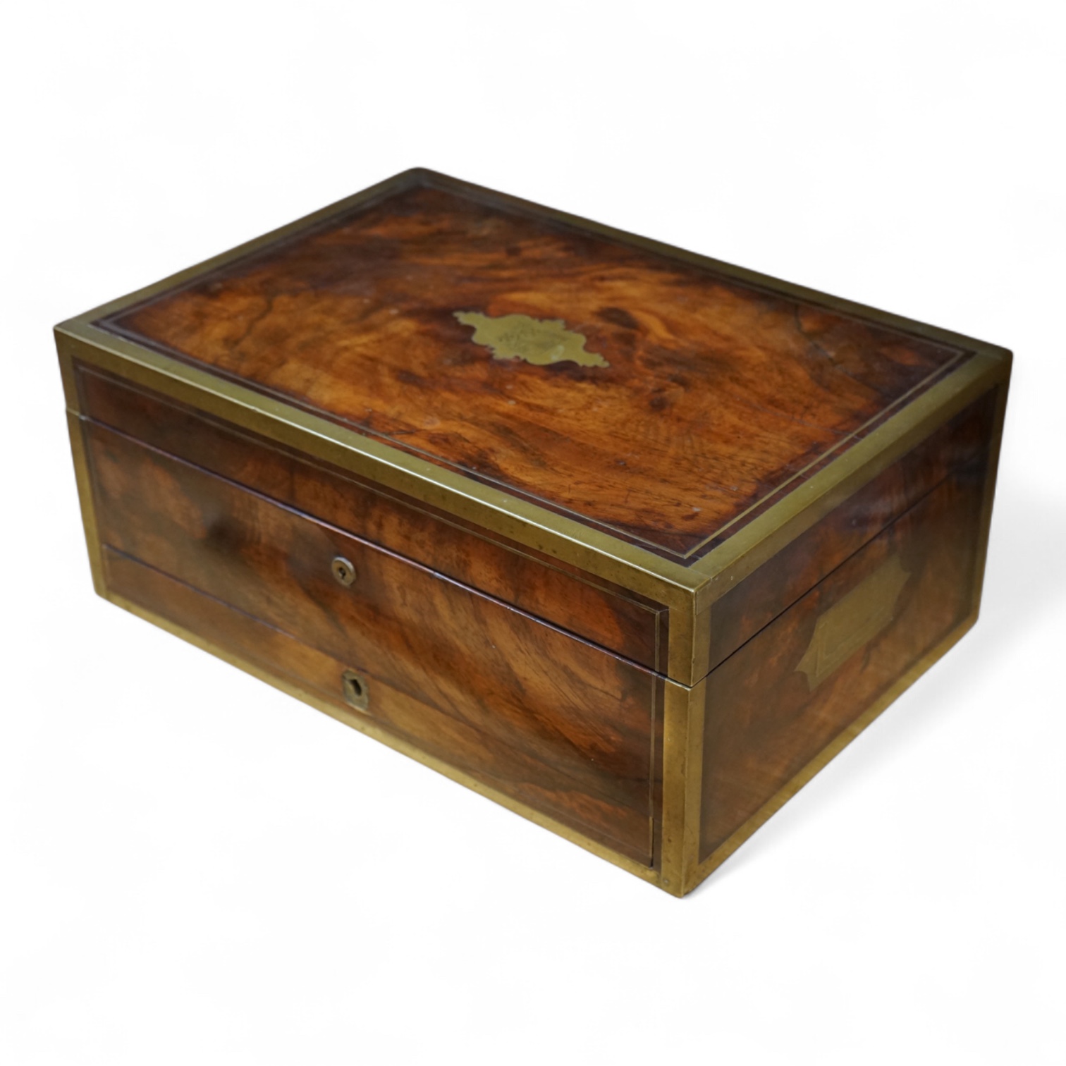 A Regency brass bound mahogany travelling tobacco box, coat of arms to centre, the inner brass cover with cedar wood lining 42.5cm wide